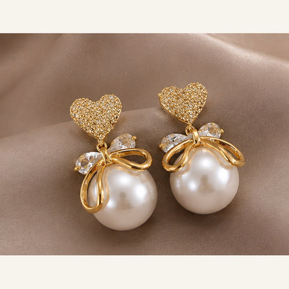 Swarnique Heart Pearl Bow Drop Earrings